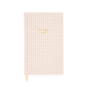 Pink and white gingham fabric planner with twenty six foil stamped on the cover
