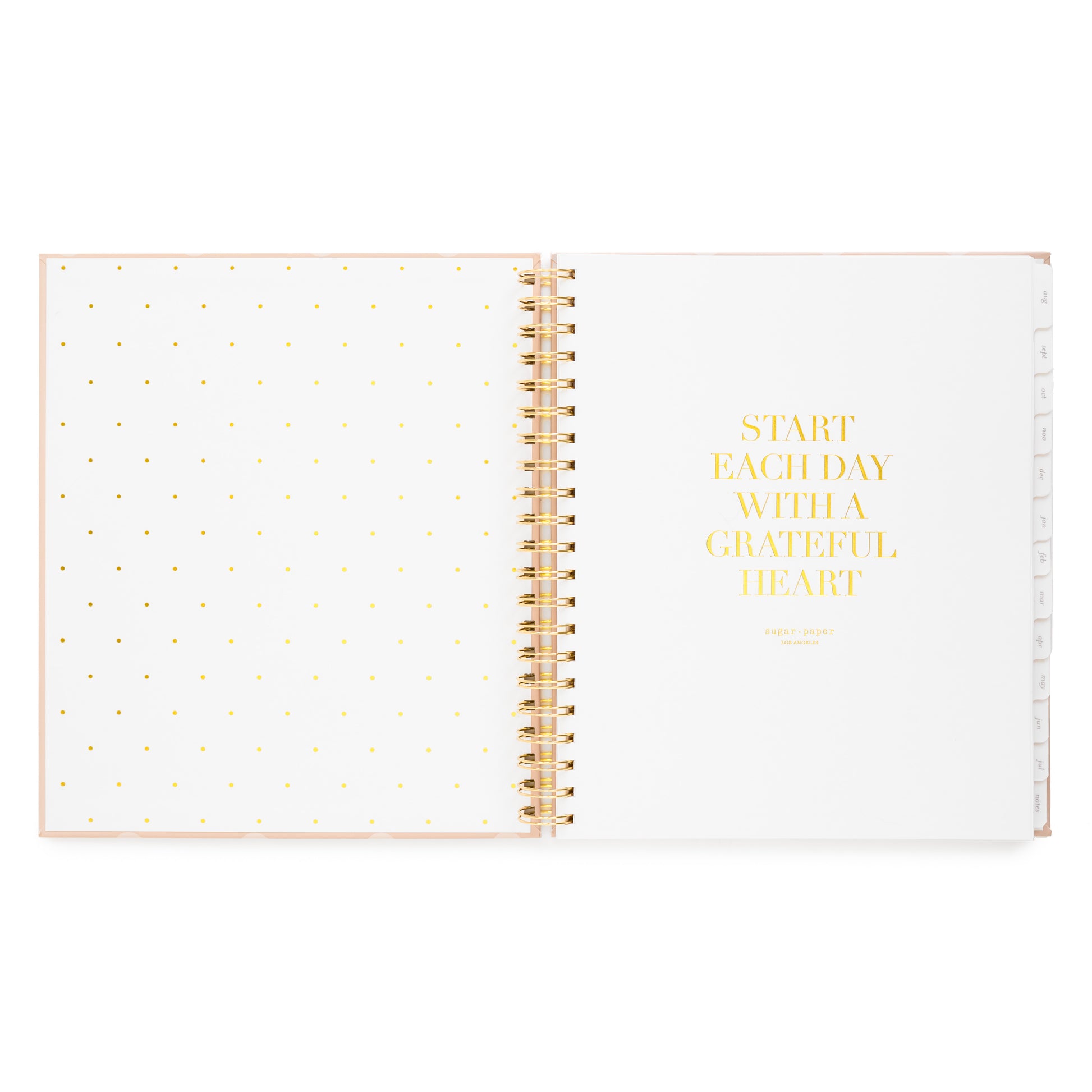 Open spiral planner with 'start each day with a grateful heart' with cover page in gold foil