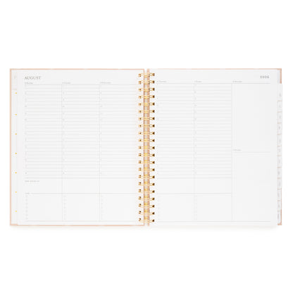 Weekly layout of spiral academic planner with hourly slots for each week day and blank spaces for saturday and sunday
