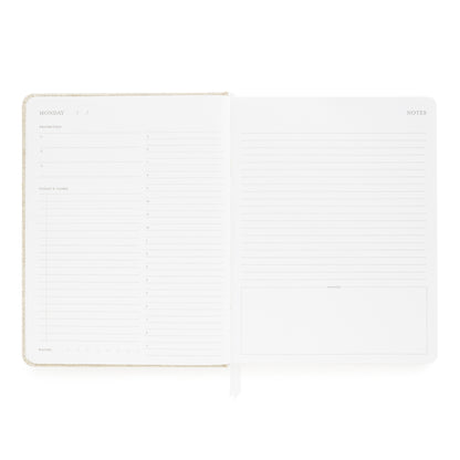 Daily planning page with prompts for priorities, tasks, and notes