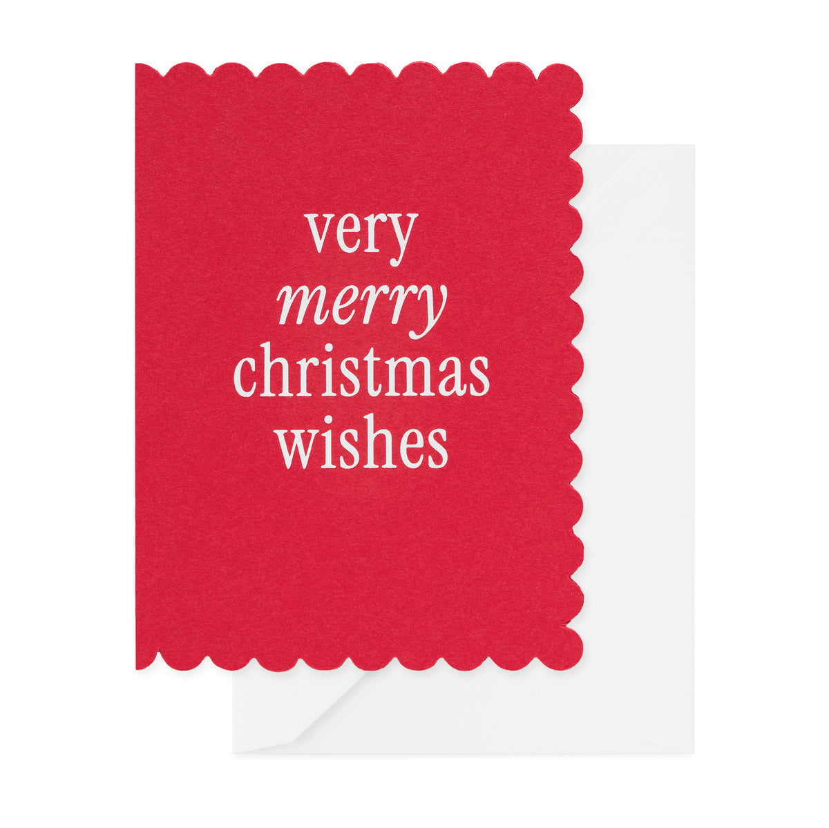 A red greeting card with scalloped edges and white text reading 'very merry christmas wishes,' shown with a white envelope