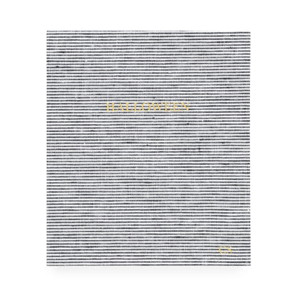A black and white striped fabric bound keepsake book with 'halloween' on cover in gold foil