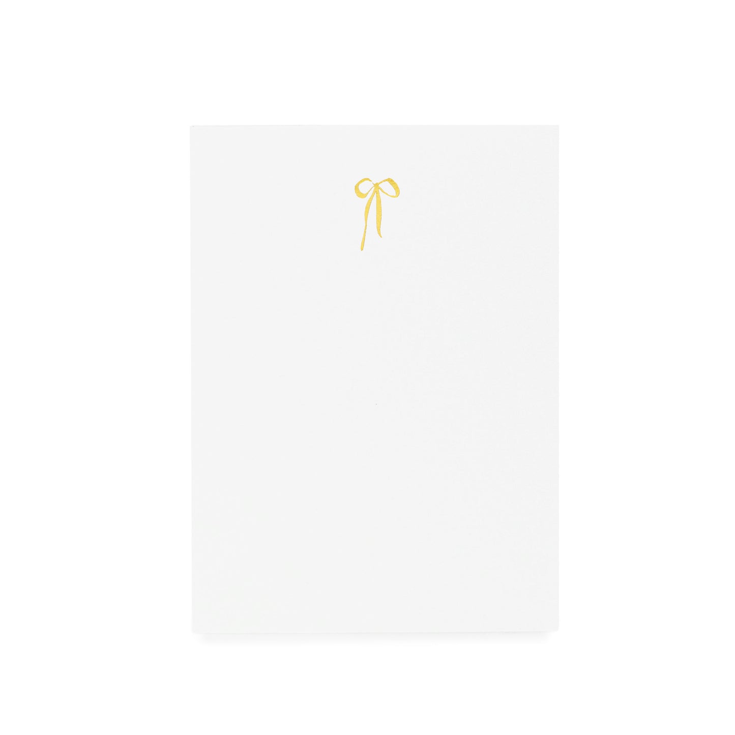White notepad with gold hand drawn bow foil printed on it