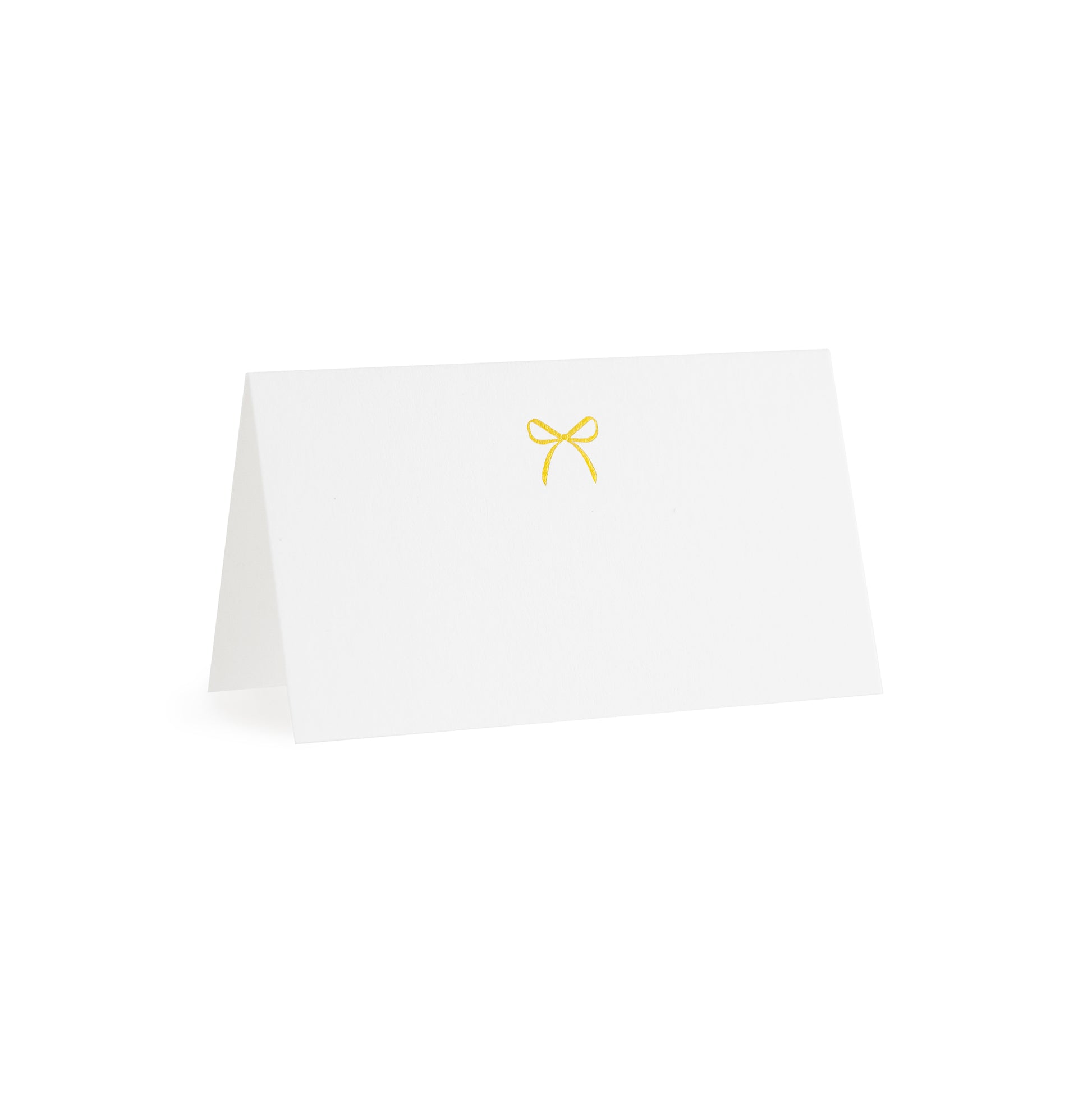 white tented place card with gold bow