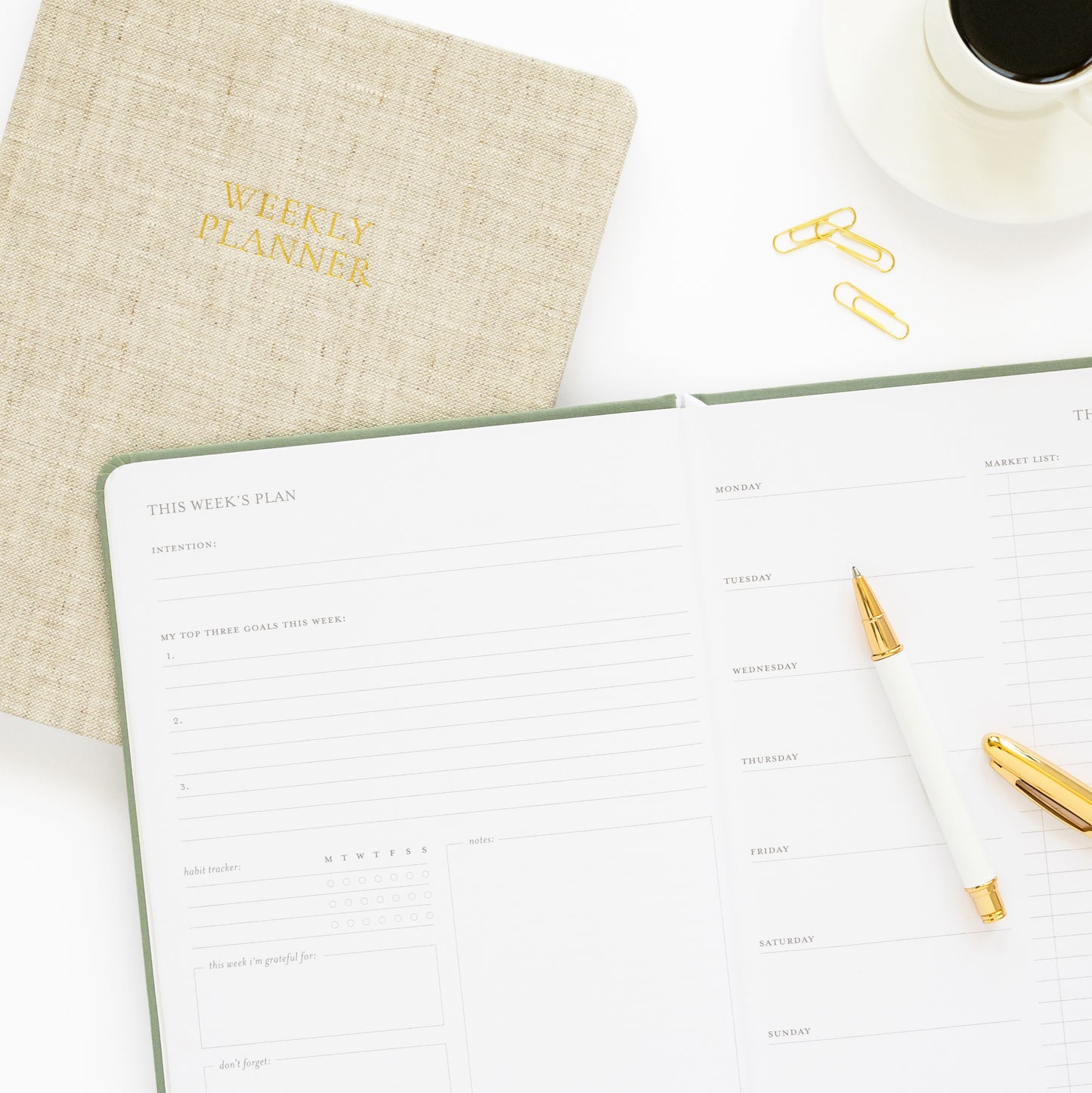 Weekly planner cover with interior of this week's plan spread