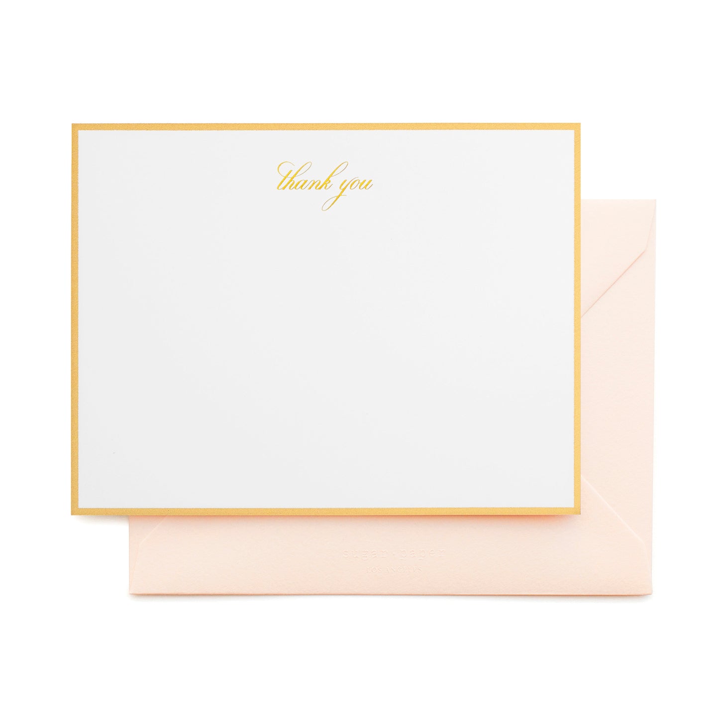 white card with gold thank you text and gold border, pale pink envelope