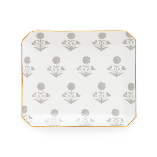A square white ceramic decorative tray featuring a repeating gray floral pattern and a thin gold border