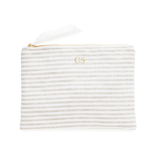 Flax and white striped fabric pouch with gold foil initials 'CS' with a white ribbon pull