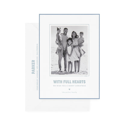 white card with photo, slate blue text and border, white envelope with slate blue text
