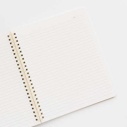Interior of spiral notebook with lined pages